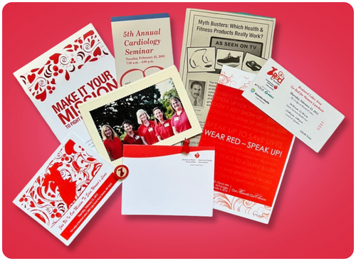 Image of an assortment of invitations, pins, pictures and other (paper) items from events of Heart Months past